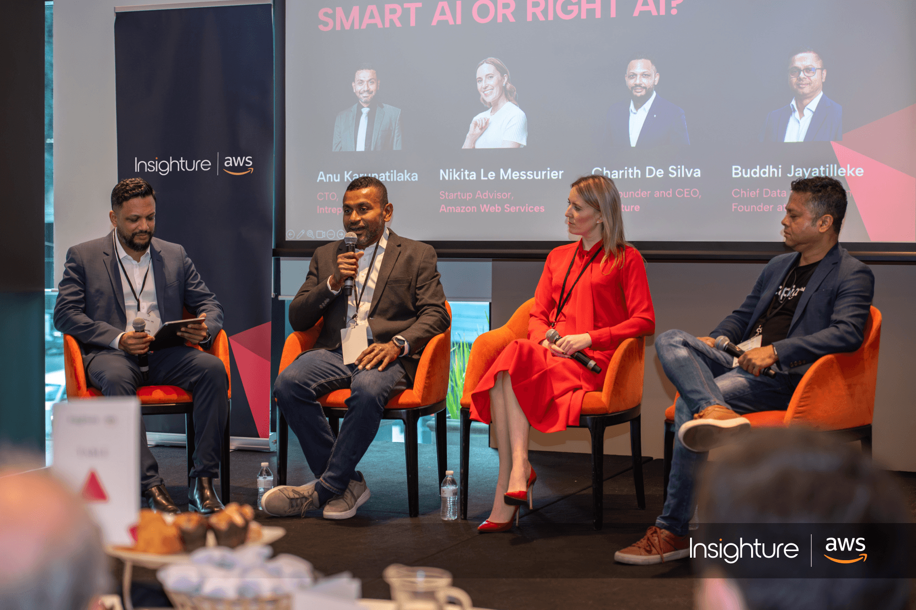 Fireside chat speakers sitting